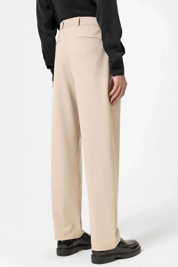 Pantalon homme Antioch beige à taille haute plissée et coupe décontractée