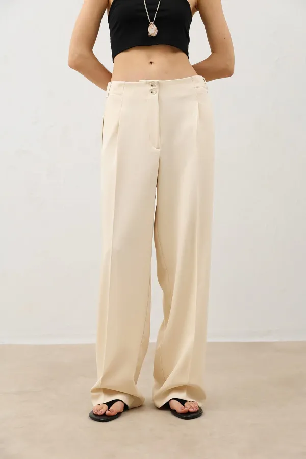 Pantalon large beige clair Antioch pour femme avec détails de pinces