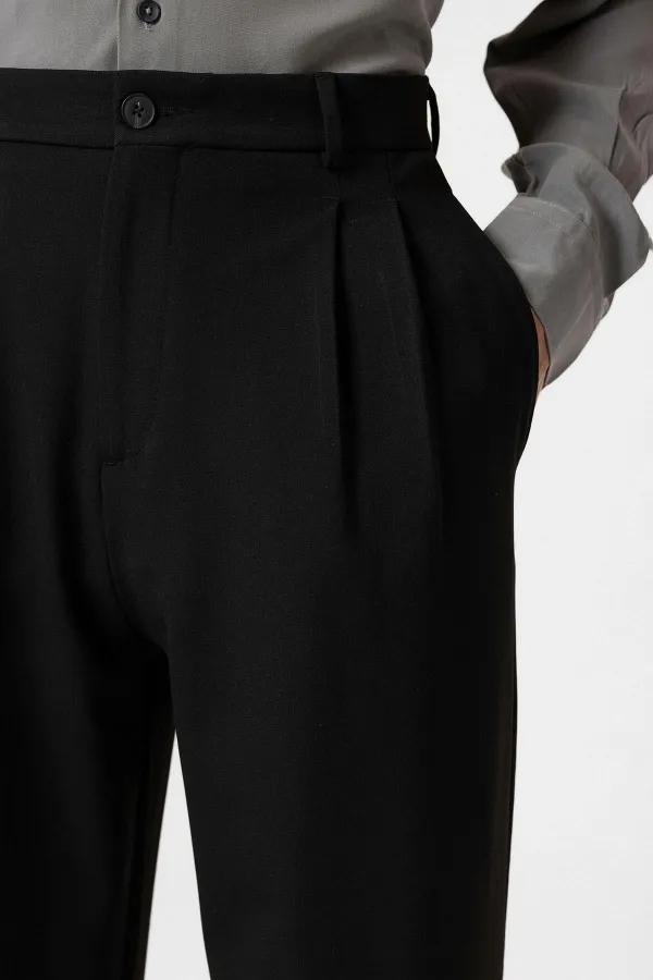 Pantalon Antioch noir à taille haute plissé et coupe décontractée pour homme