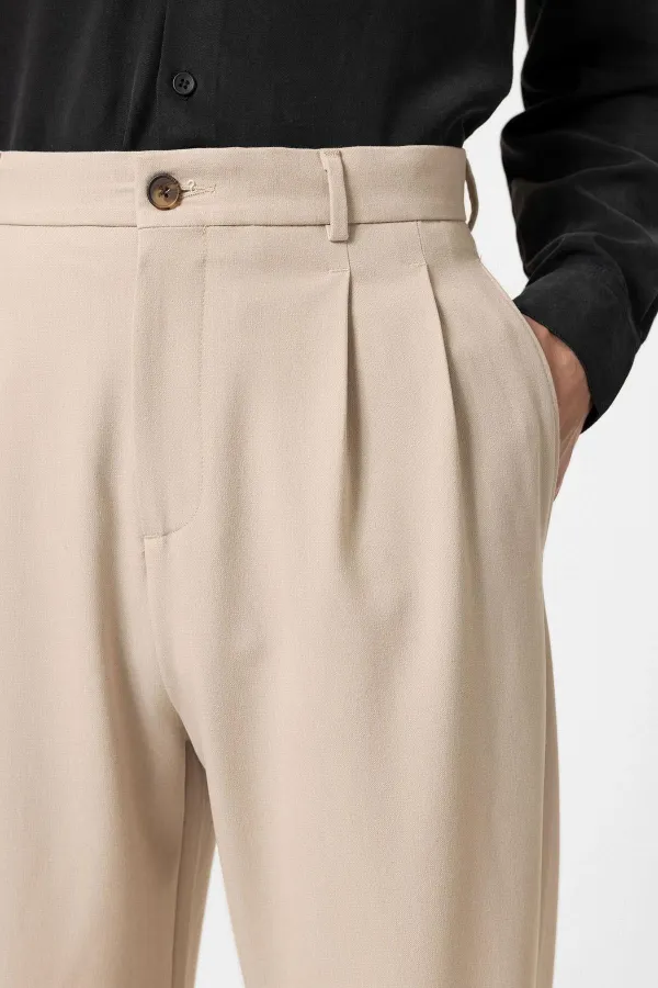 Pantalon homme Antioch beige à taille haute plissée et coupe décontractée