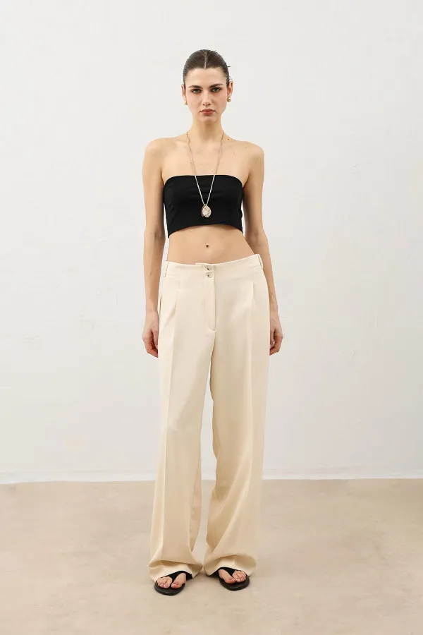 Pantalon large beige clair Antioch pour femme avec détails de pinces