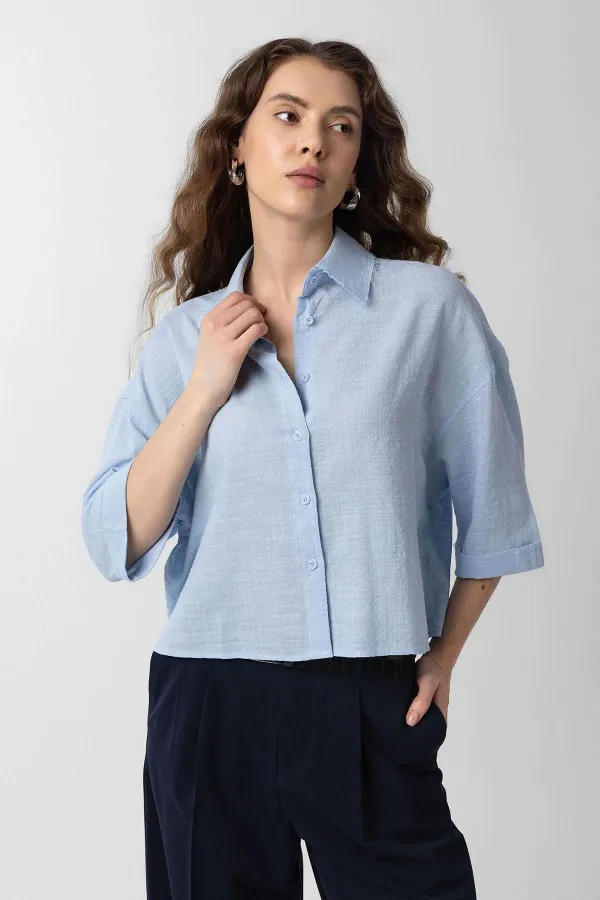 Chemise courte texturée bleue Antioch pour femme