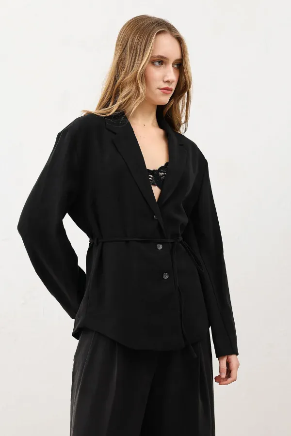 Veste cintrée noire drapée Antioch