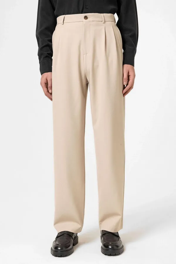 Pantalon homme Antioch beige à taille haute plissée et coupe décontractée