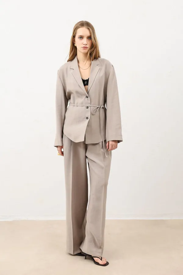 Veste cintrée drapée beige Antioch