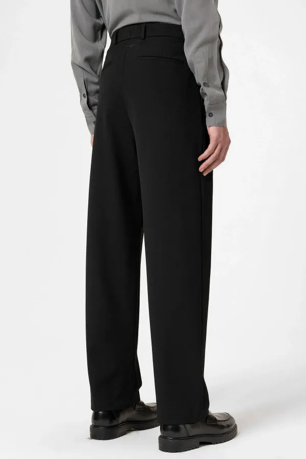 Pantalon Antioch noir à taille haute plissé et coupe décontractée pour homme