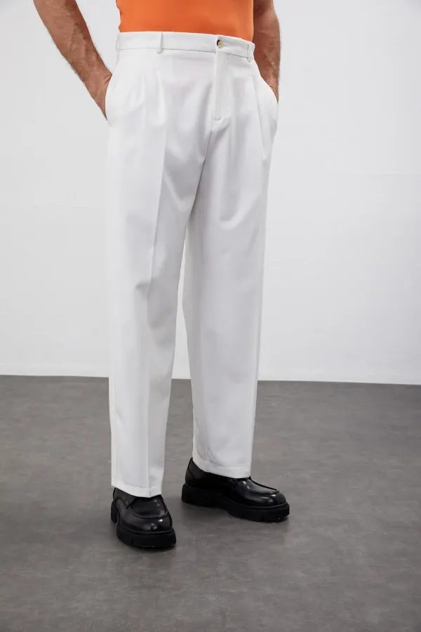 Pantalon Antioch écru à taille haute plissé et coupe décontractée pour homme