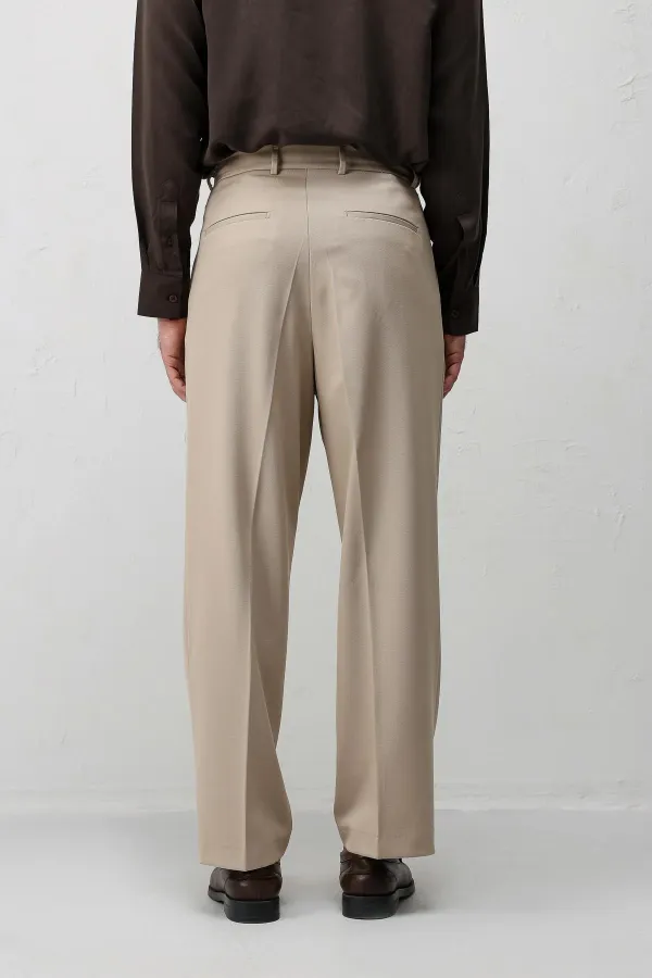 Pantalon plissé Antioch beige coupe décontractée pour homme