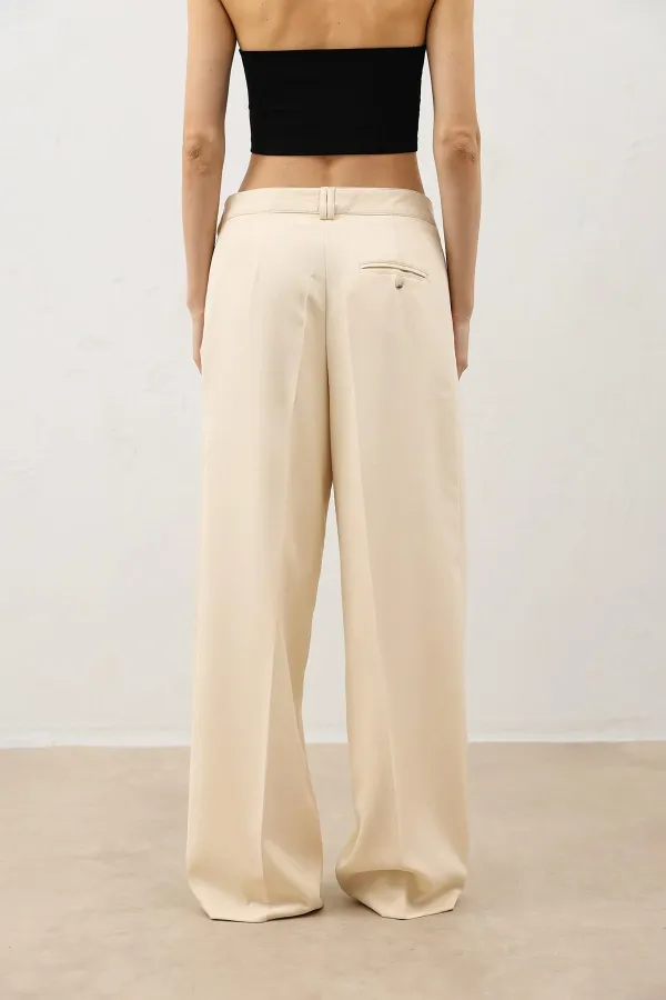 Pantalon large beige clair Antioch pour femme avec détails de pinces