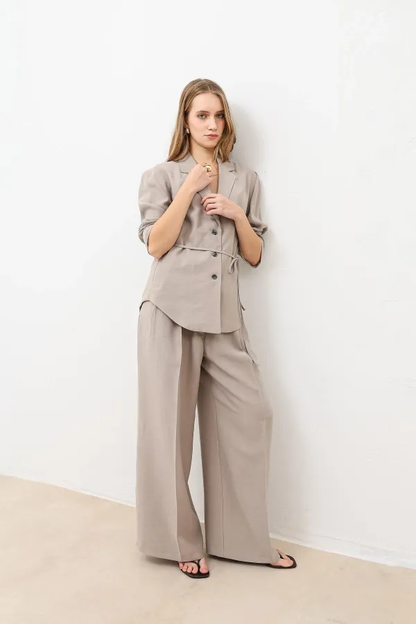 Veste cintrée drapée beige Antioch