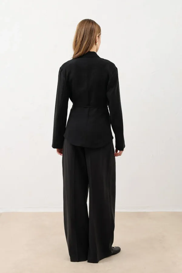 Veste cintrée noire drapée Antioch