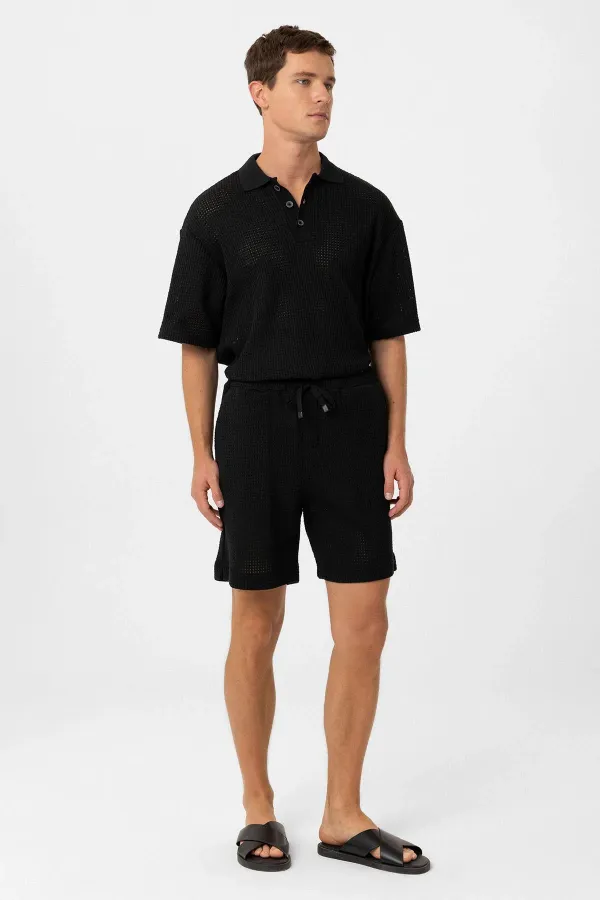 T-shirt homme Antioch noir à col polo texturé et coupe décontractée