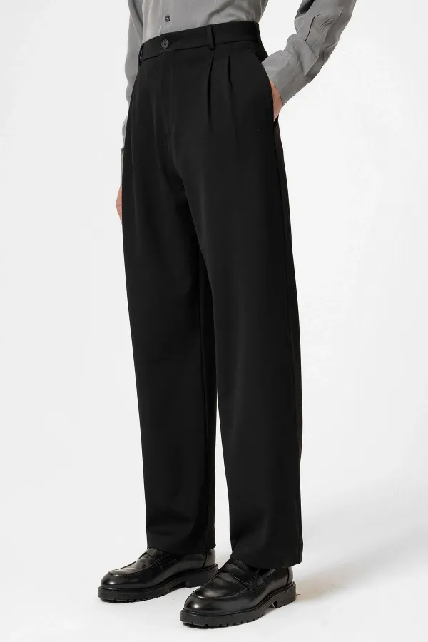 Pantalon Antioch noir à taille haute plissé et coupe décontractée pour homme