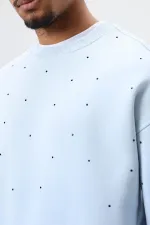 Sweat-shirt oversize bleu ciel à détails pierre délavée