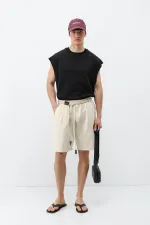 Short oversize en lin naturel avec ceinture