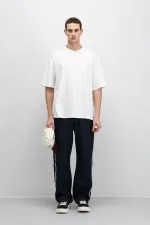 Jean ample à coutures latérales, bleu foncé