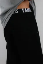 Jean noir ample à poches