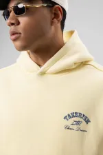 Sweat à capuche jaune oversize délavé à coupe carrée