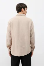 Chemise oversize beige en coton texturé