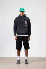 Sweat à capuche oversize noir à imprimé délavé