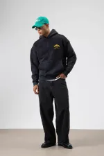 Sweat à capuche noir oversize délavé à coupe carrée