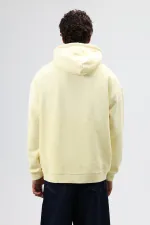 Sweat à capuche oversize jaune avec détails brodés