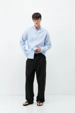 Pantalon ample en lin noir avec taille élastiquée