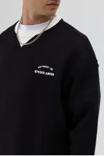 Sweat-shirt noir oversize à col rond imprimé