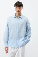 Chemise oversize bleue aspect lin texturé