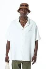 Chemise oversize délavée à manches courtes imprimée au dos, sans poches, écru