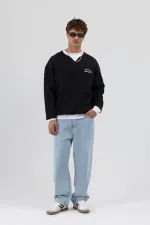 Sweat-shirt noir oversize à col rond imprimé