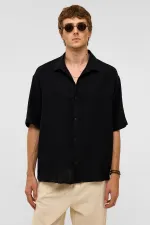 Chemise oversize à manches courtes en mousseline, noire