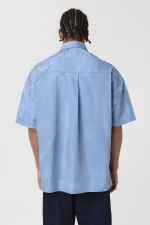 Chemise oversize en popeline délavée, bleue