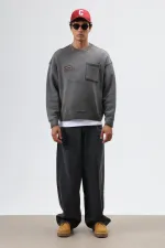 Sweat-shirt oversize à col rond et poches, noir