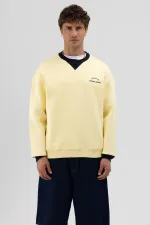 Sweat-shirt jaune oversize à col rond imprimé