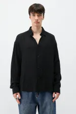 Chemise oversize légèrement texturée noire
