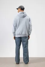 Sweat à capuche gris oversize à imprimé délavé