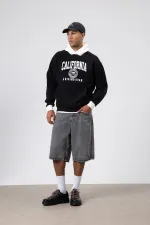 Sweat-shirt oversize noir imprimé bicolore