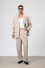 Costume oversize ceinturé couleur pierre