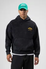 Sweat à capuche noir oversize délavé à coupe carrée