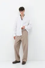 Pantalon ample en lin avec taille élastiquée, couleur vison