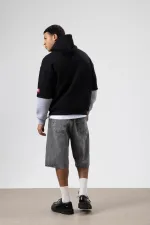 Sweat à capuche imprimé oversize noir