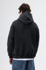 Sweat à capuche imprimé oversize noir