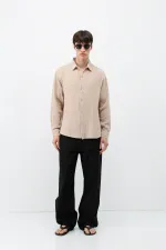 Chemise oversize beige en coton texturé