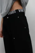 Jean noir ample à poches