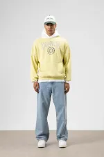 Sweat à capuche imprimé oversize jaune