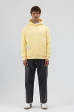 Sweat-shirt à capuche oversize imprimé jaune