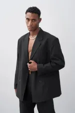 Costume noir à double boutonnage coupe décontractée