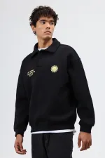 Sweat-shirt noir oversize à col polo imprimé délavé