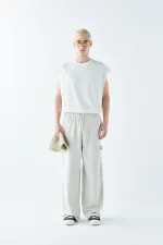 Pantalon de survêtement oversize avec ourlet travaillé et poches latérales, gris glacé